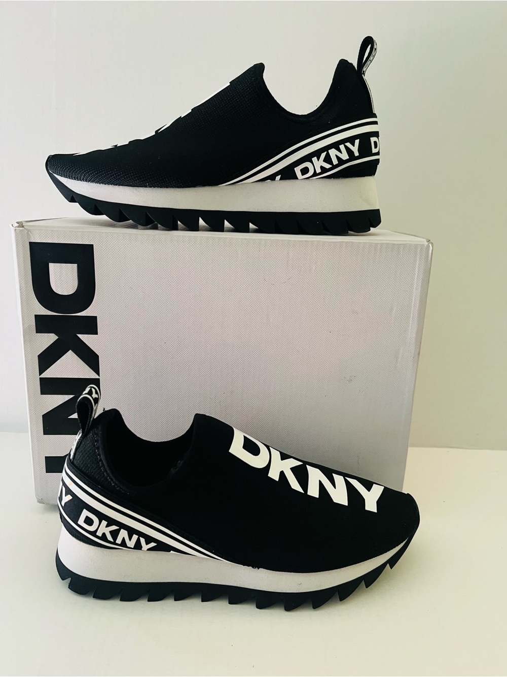 DKNY Abbi Black & White Slip-On Logo Knit Sneaker